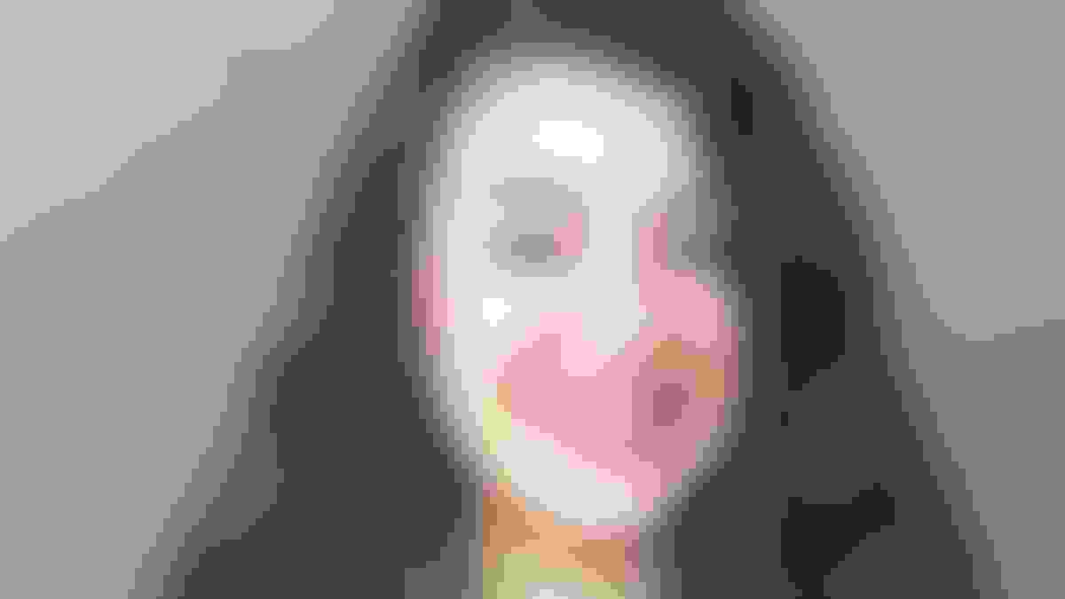 a woman in her 20s with long hair who possibly has PCOS