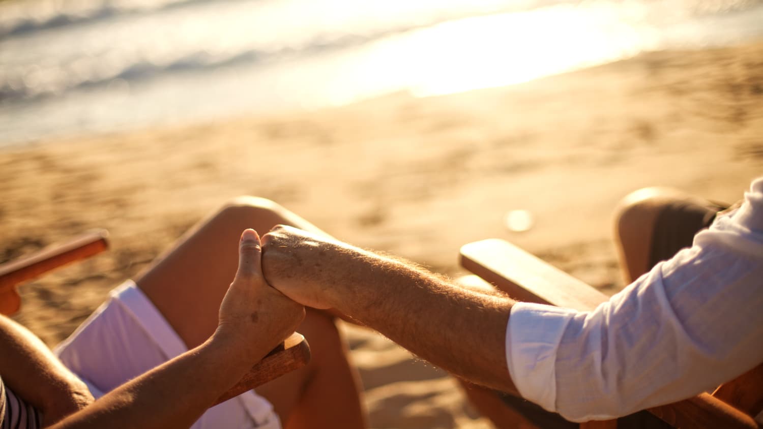 Couple holds hands after one of them. One of them has atrial fibrillation.