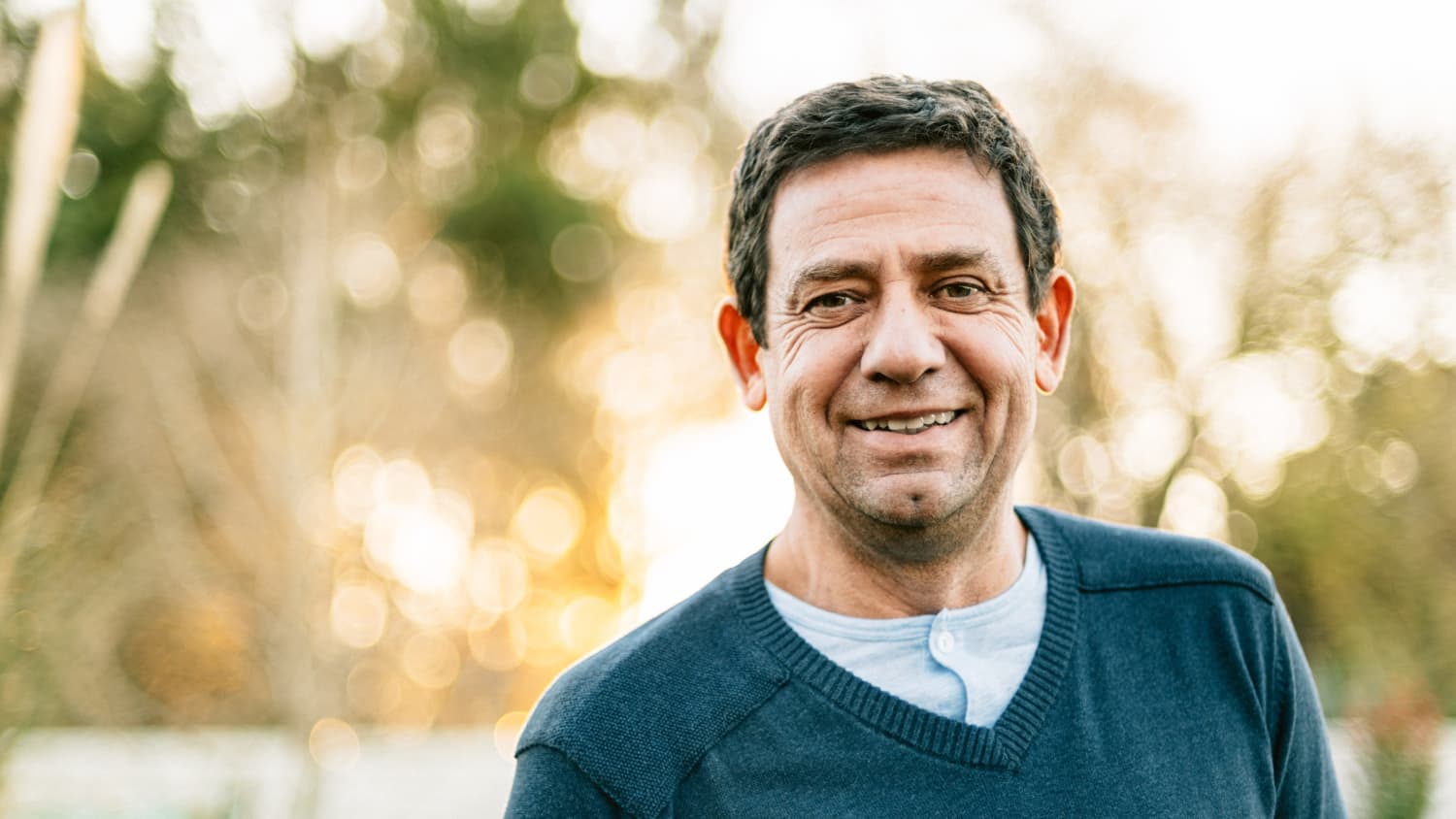 smiling man after treatment for Hodgkin Lymphoma