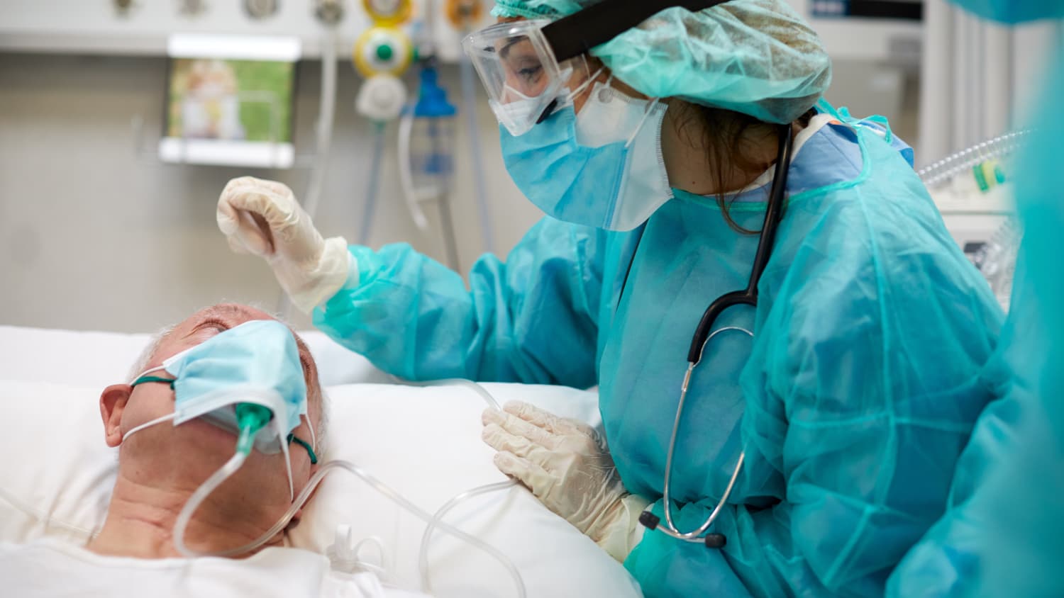 surgical nurse with patient before surgery
