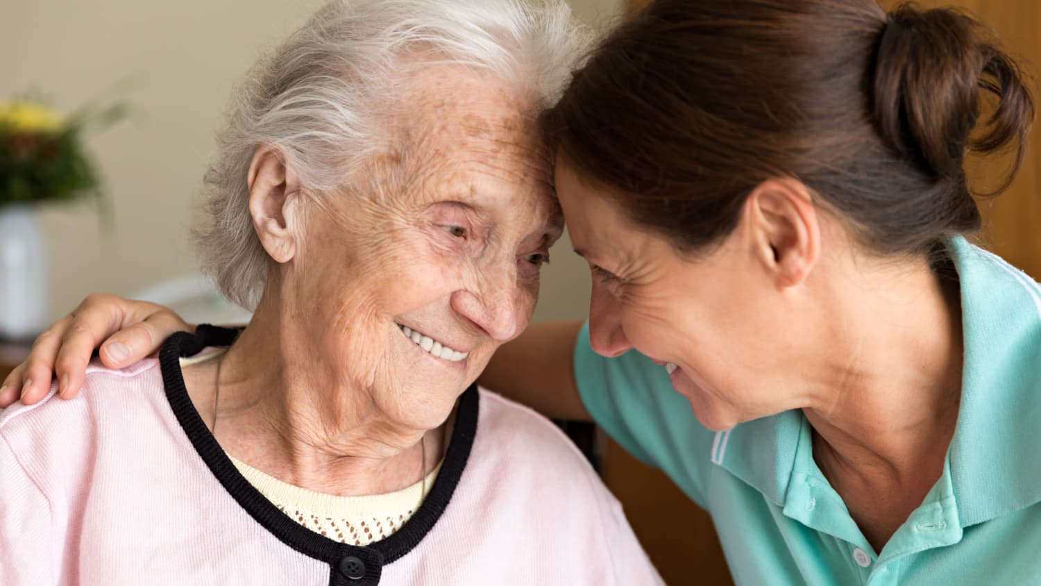 caregiver close with a loved one with Alzheimer's disease