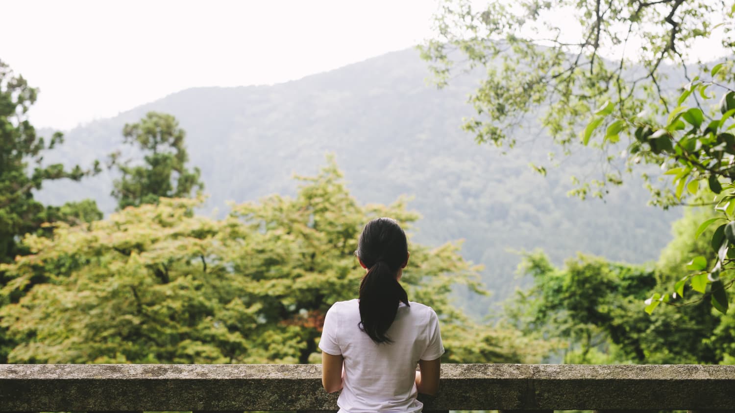 woman contemplating direction in life, especially during a quarter-life crisis