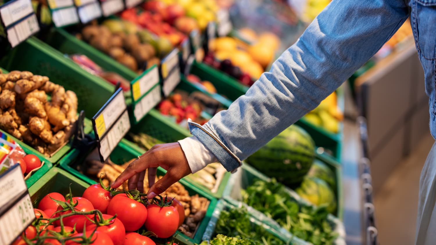 Woman Buying Produce at Grocery Store