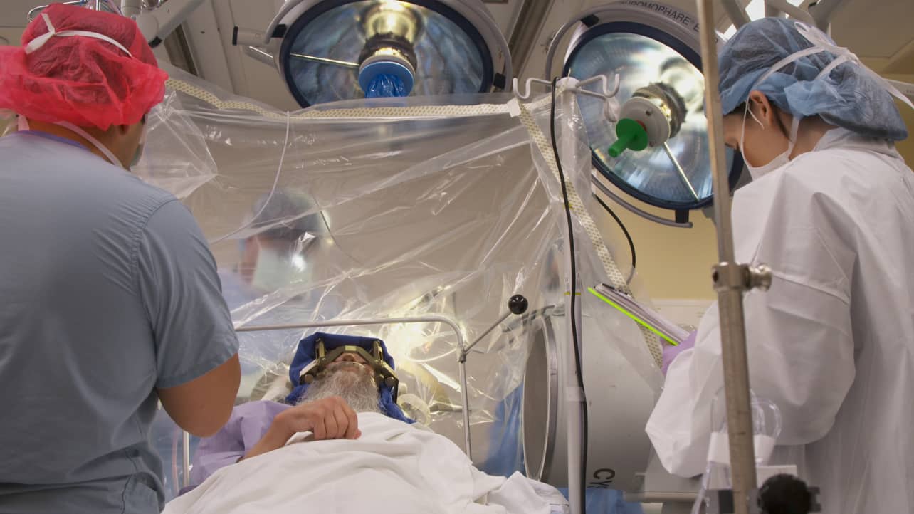 A patient undergoes deep brain stimulation while awake.