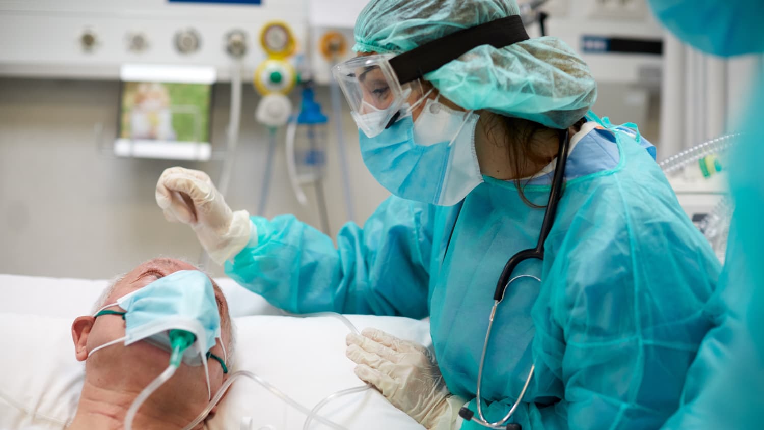 surgical nurse with patient before surgery