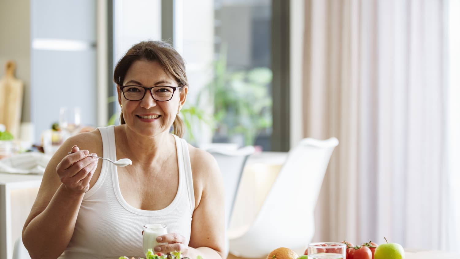 woman with Percutaneous Coronary Intervention (PCI) eating