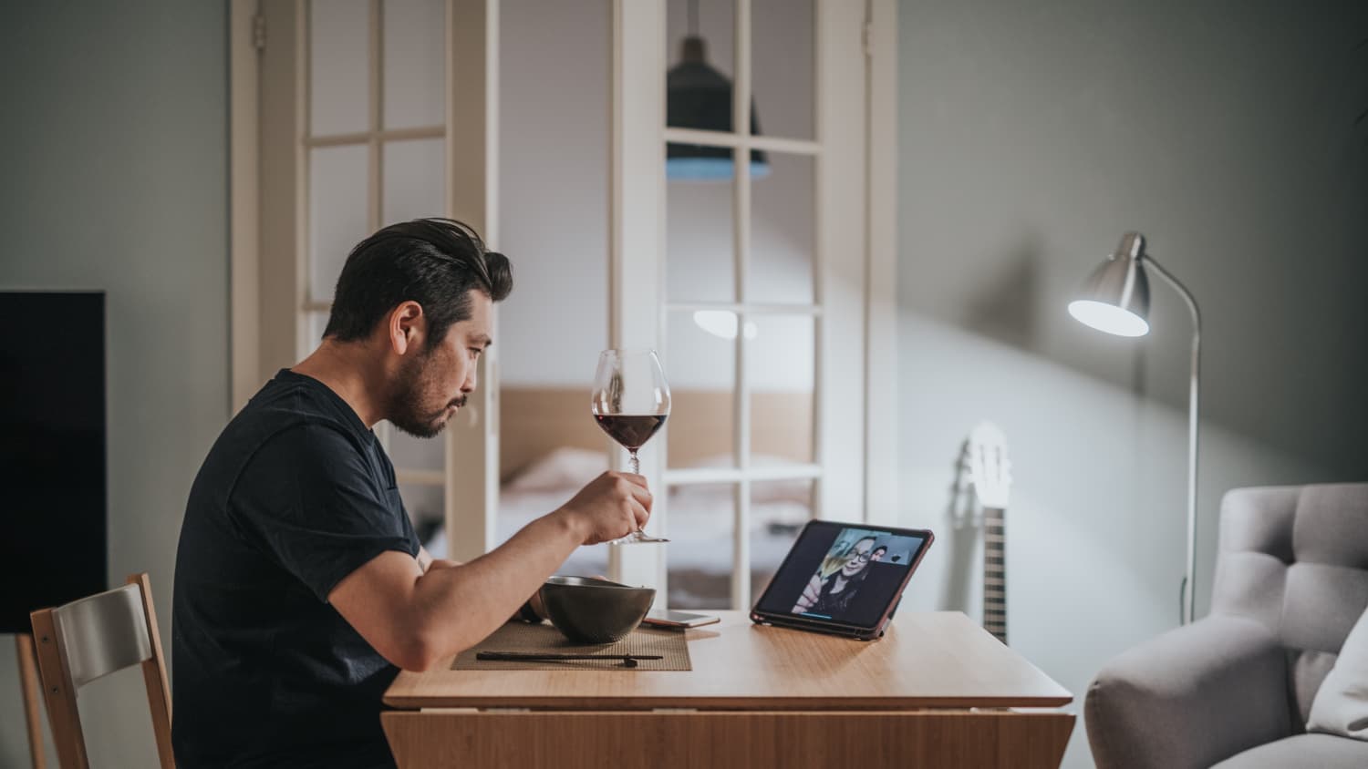 person drinking alcohol alone during the COVID-19 pandemic