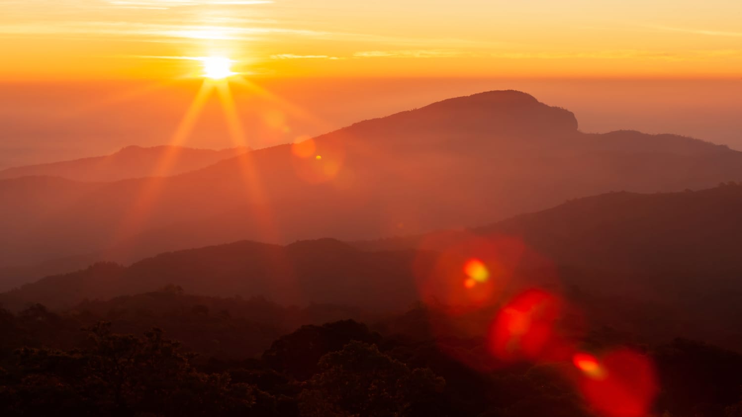 sunrise over mountains, representing new treatments for myasthenia gravis