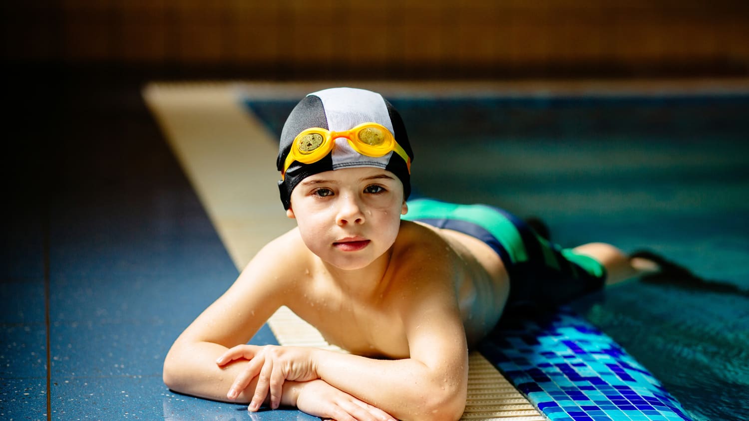 young boy swimming