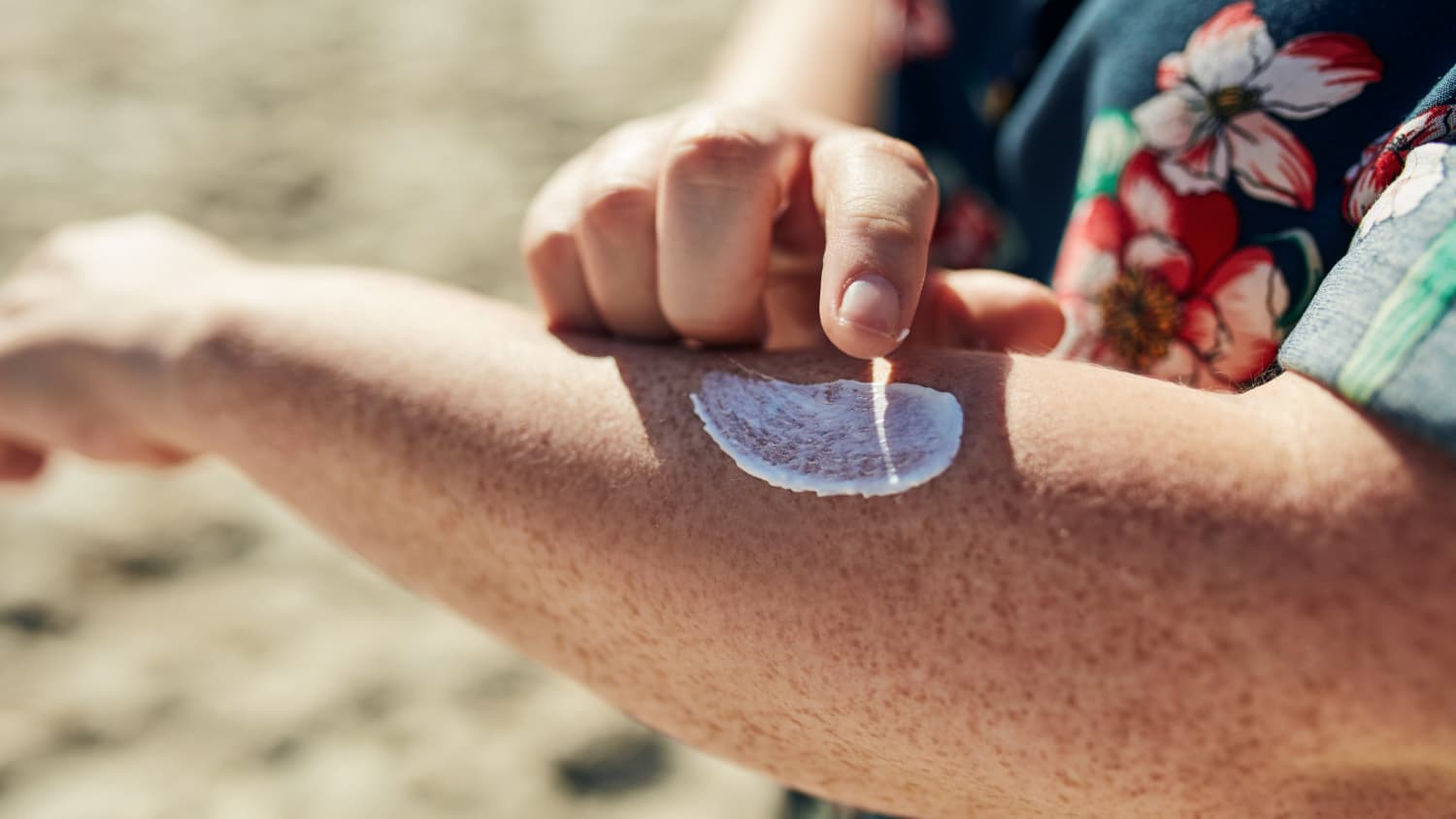 someone applying sunscreen