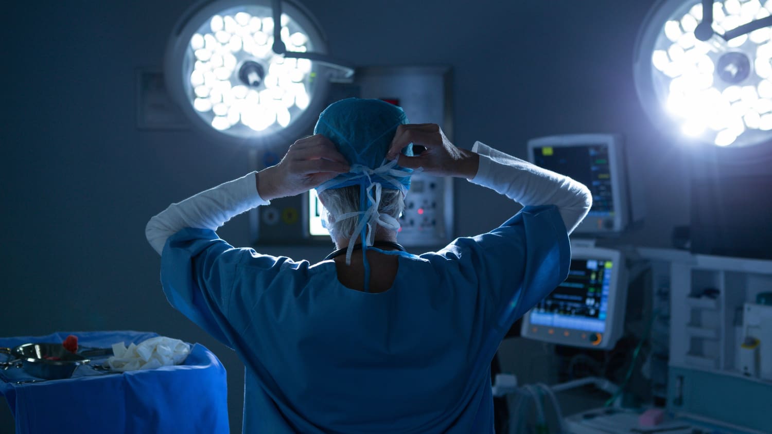 female colorectal surgeon preparing for rectal cancer surgery