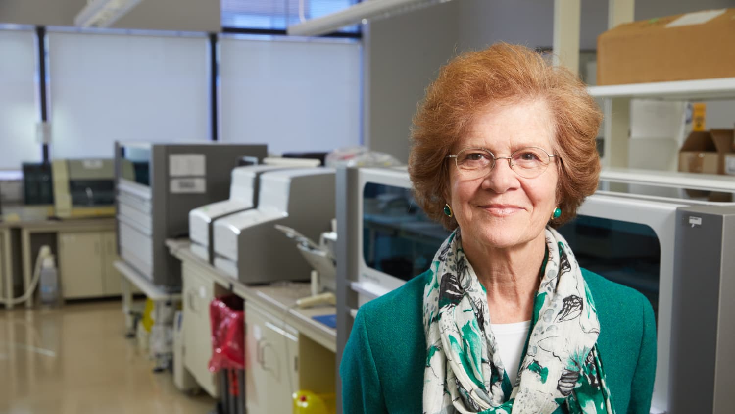 Marie Louise Landry, MD, an infectious disease specialist discussing equipment used to detect strains of the flu virus