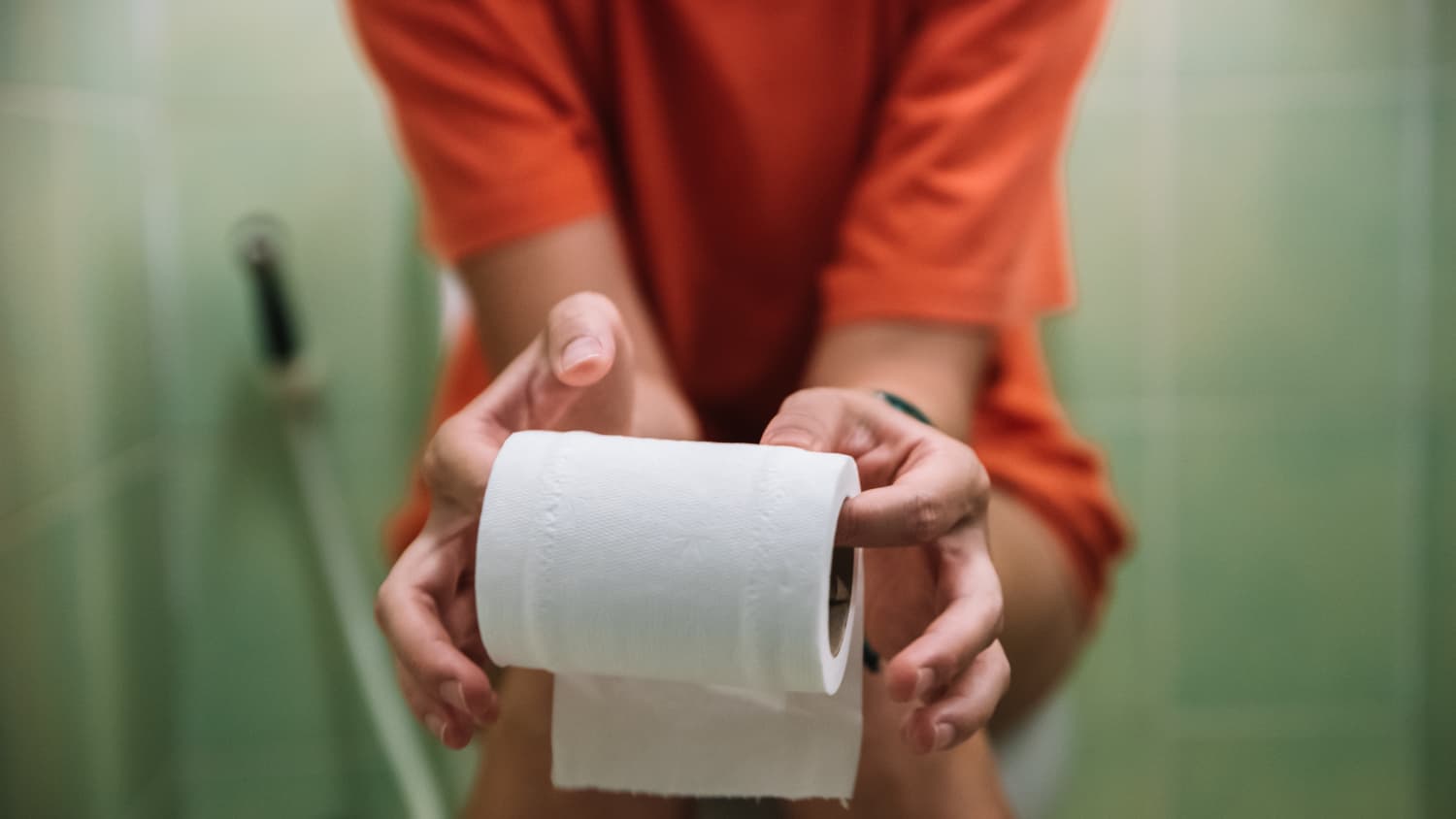 a person in the bathroom dealing with Urinary Retention