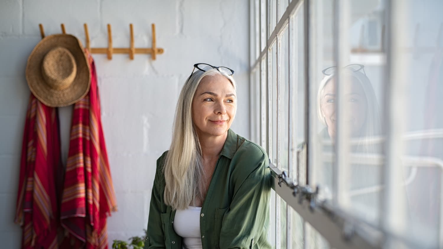 Mature woman thinking, possibly about metastatic brain tumors