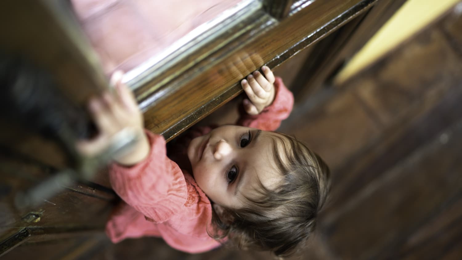 child climbing up cabinet, possibly needing to go to the ED during COVID-19