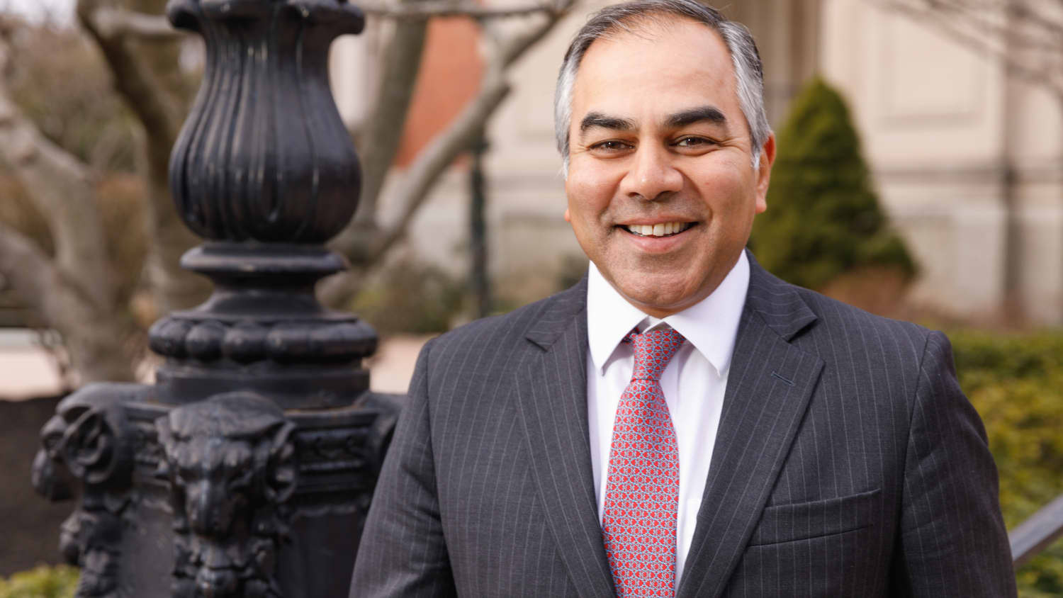 Portrait taken outdoors of Sanjay Kulkarni, MD, medical director of the Center for Living Donors at Yale New Haven Health