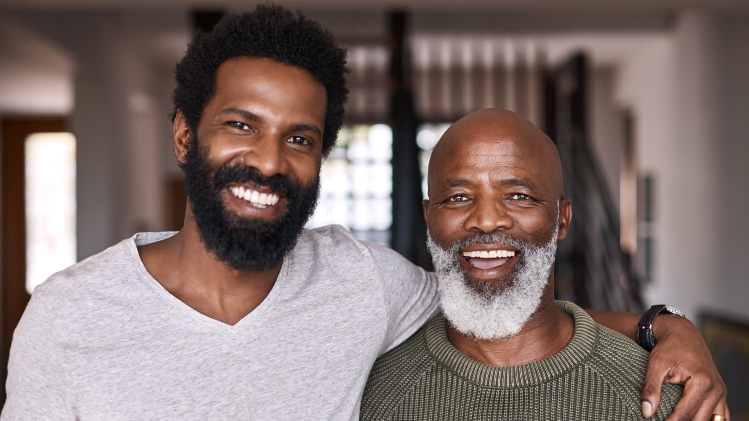 father and son with arms around each other after treatment for gastrointestinal stromal tumors