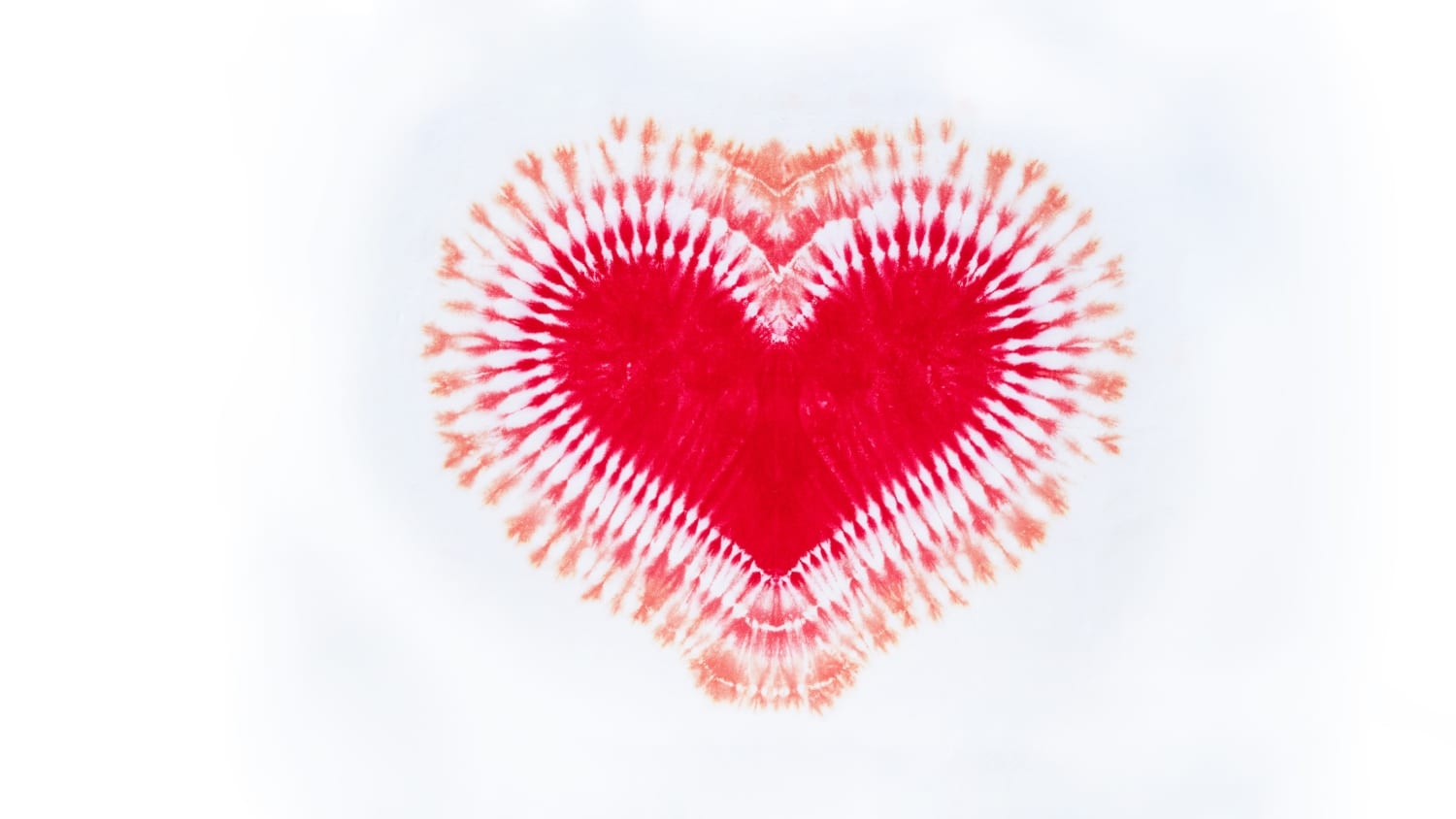 photograph of a tie-dye heart, representing efforts to eliminate the stigma associated with menstruation