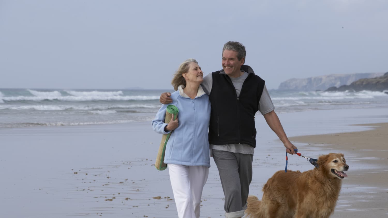 man with Enlarged Prostate (Benign Prostatic Hyperplasia) walks on beach