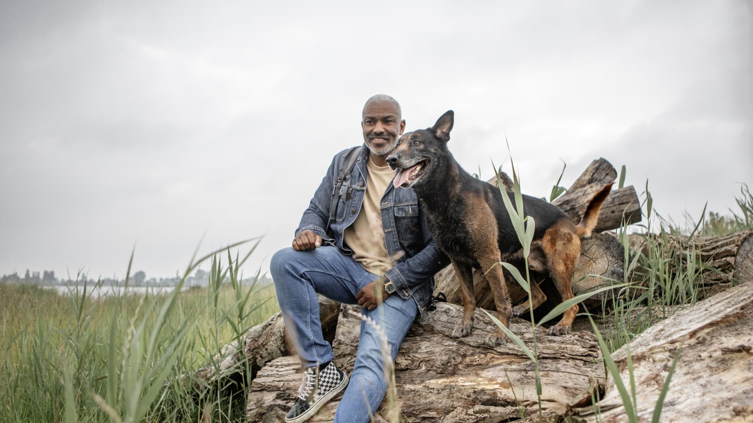 man who has Anal Cancer plays with his dog