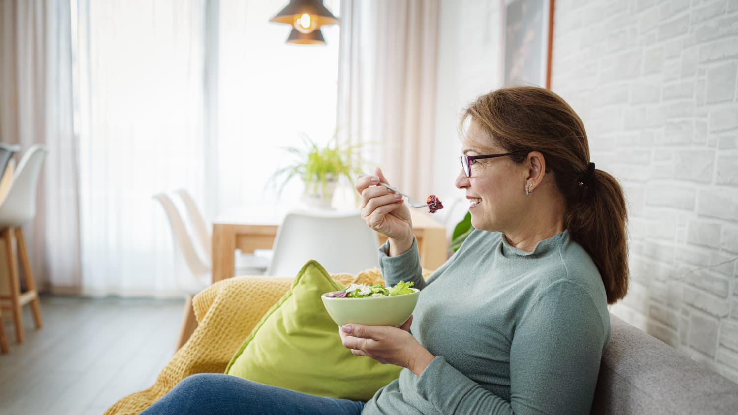 person with diabetes eating a salad