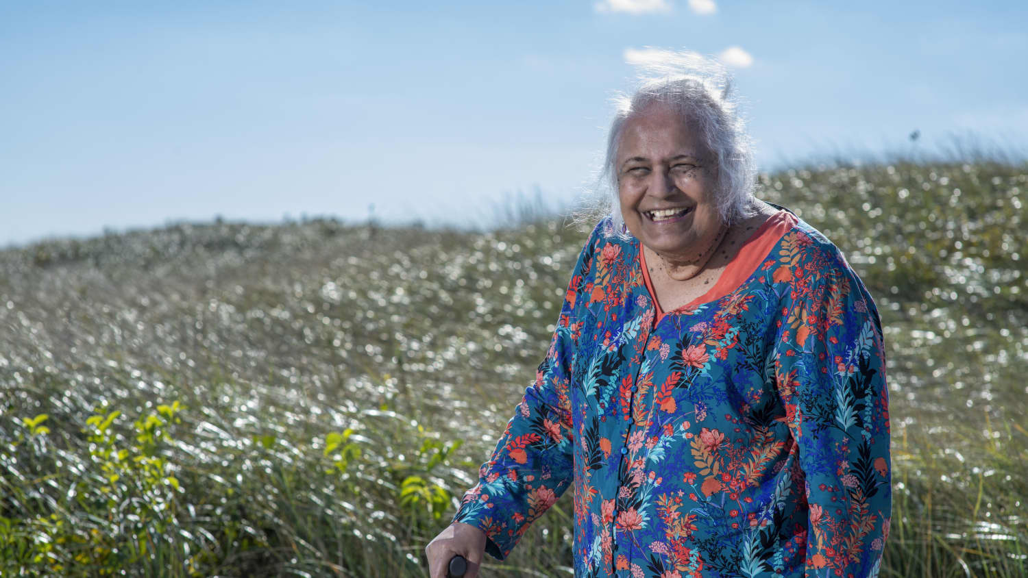 Jayanti in a field of wildflowers