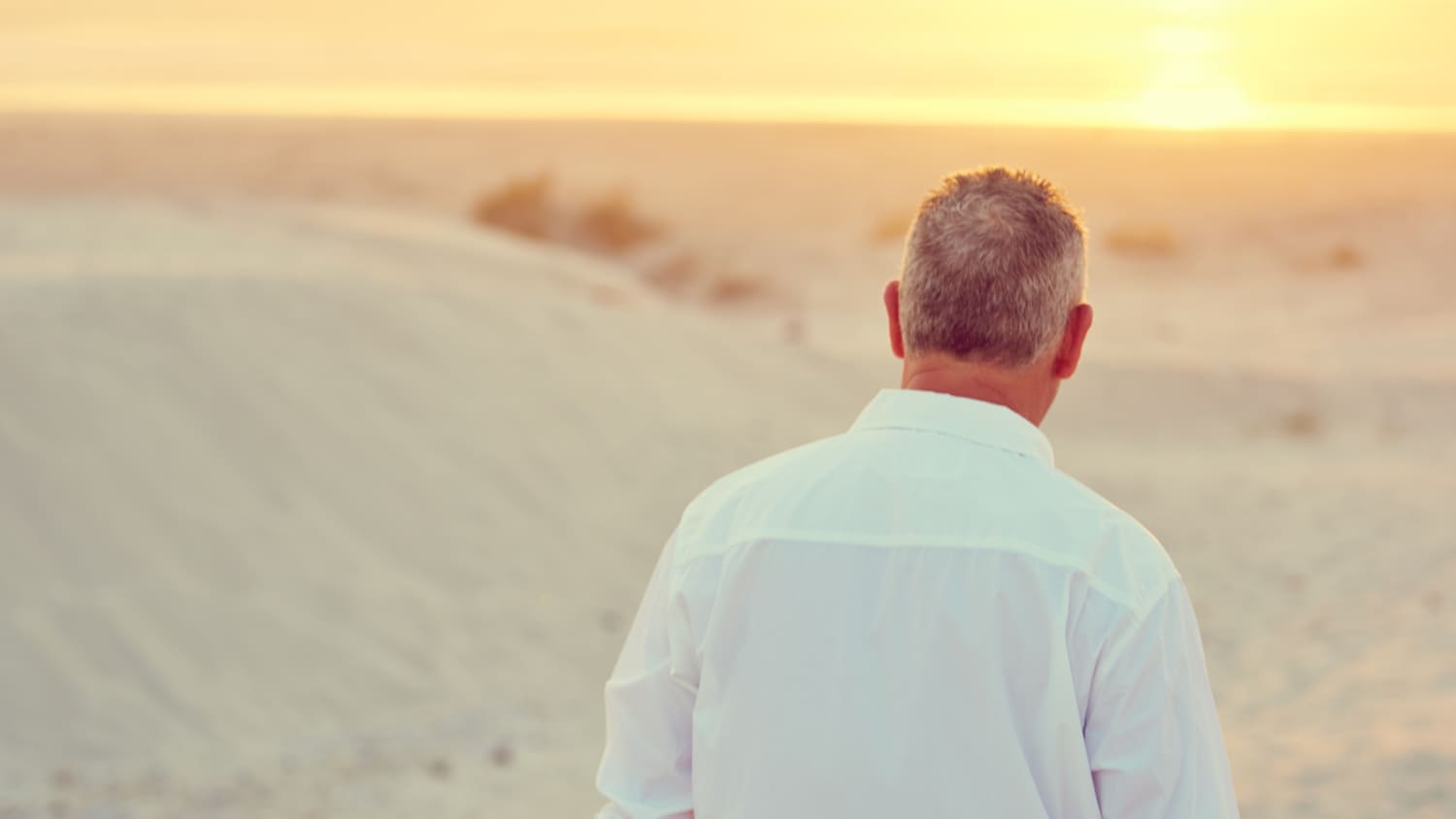 man looking thoughtful, possibly thinking about dystonia diagnosis