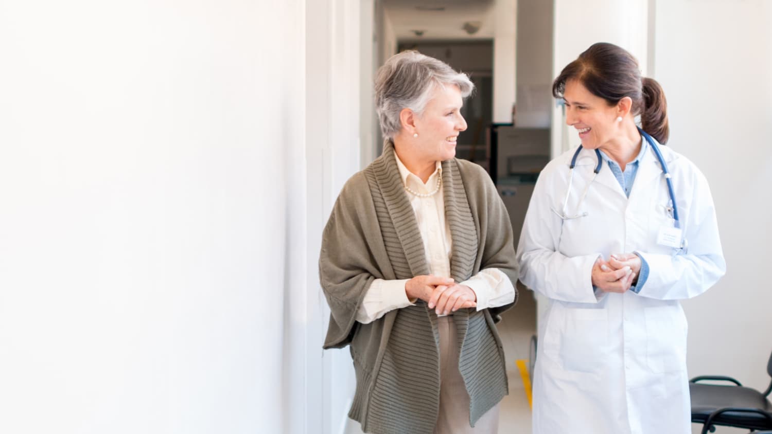 A doctor speaks to a patient about External Radiation Therapy.