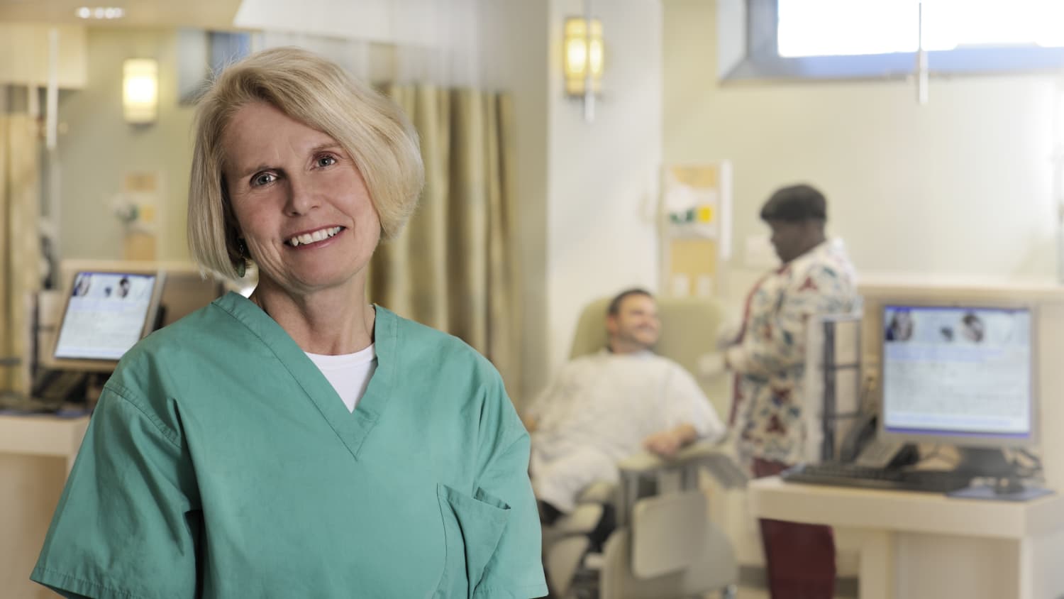 A nurse standing in a clinic room