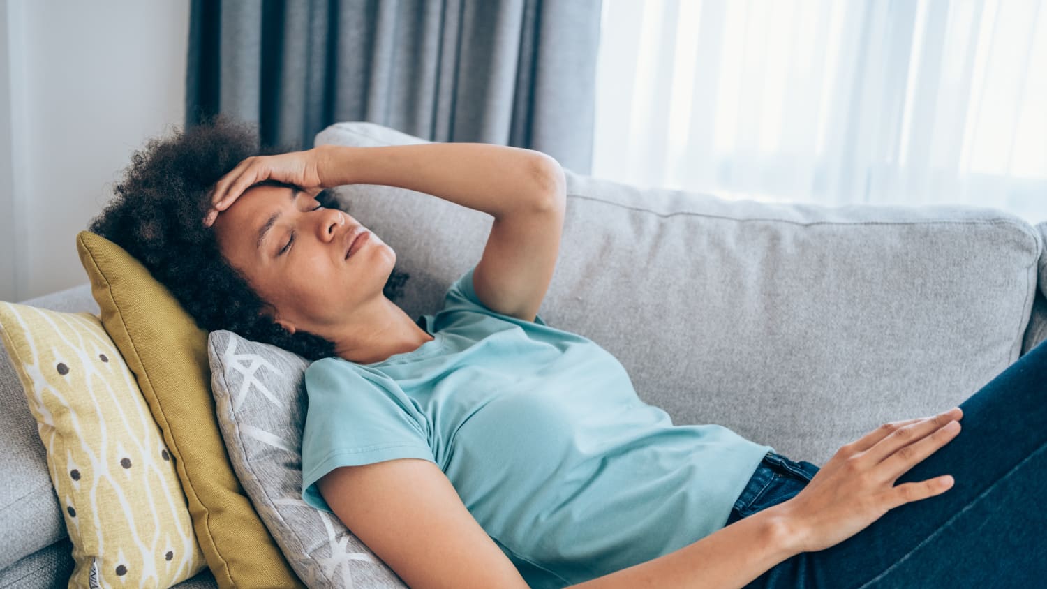 woman sick with flu and covid-19