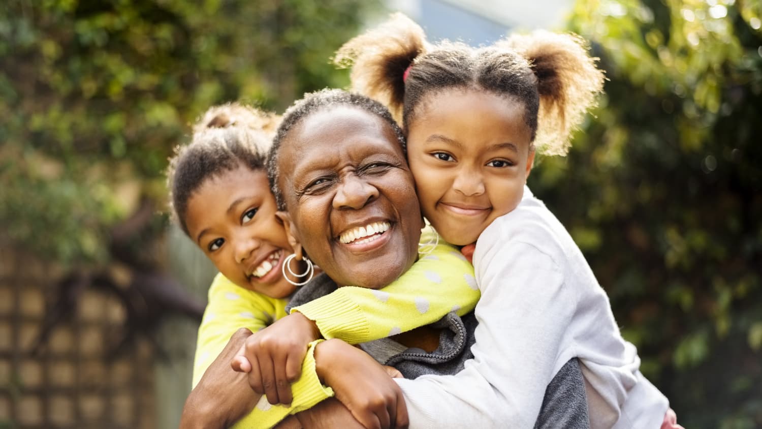 woman playing with grandchildren after a liver transplant