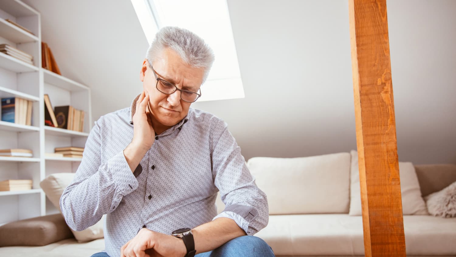 a man with tachycardia checking pulse