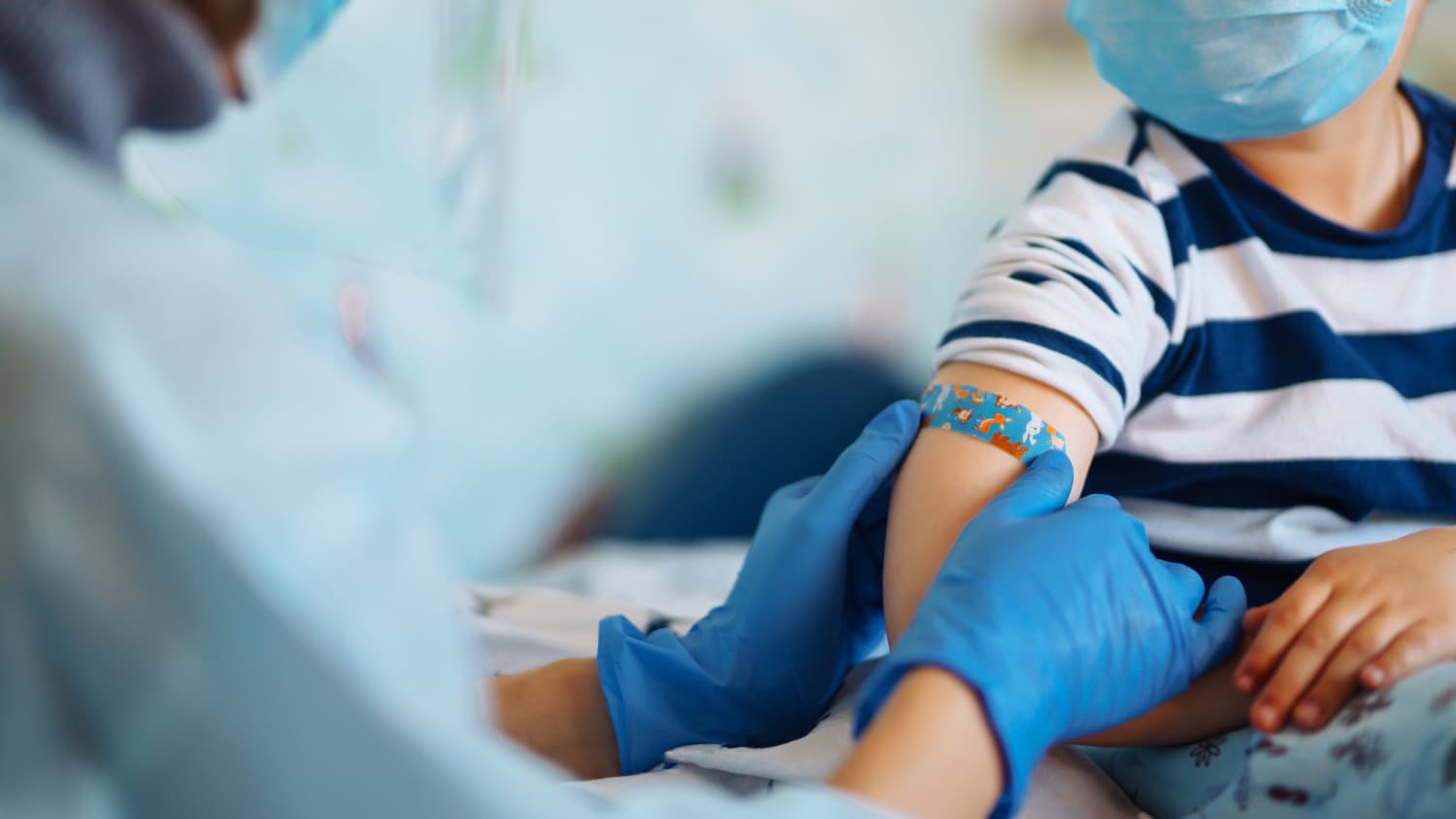 child receiving vaccinations