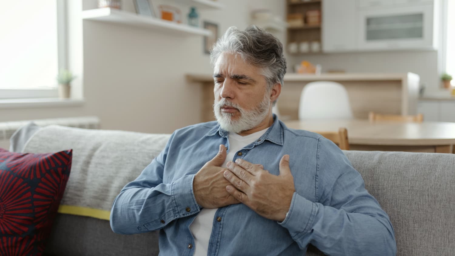 man suffering from angina