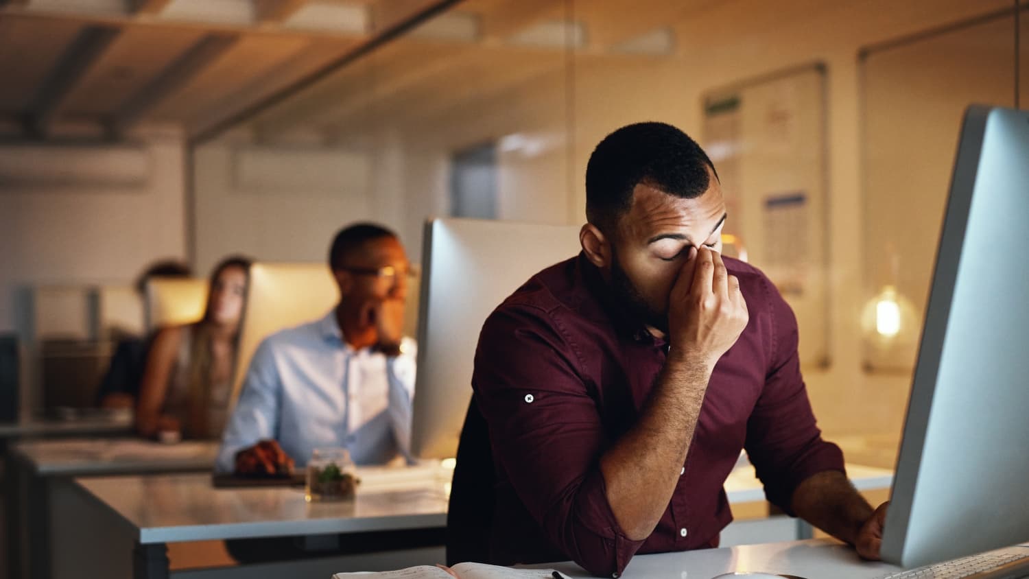 person sitting at an office desk