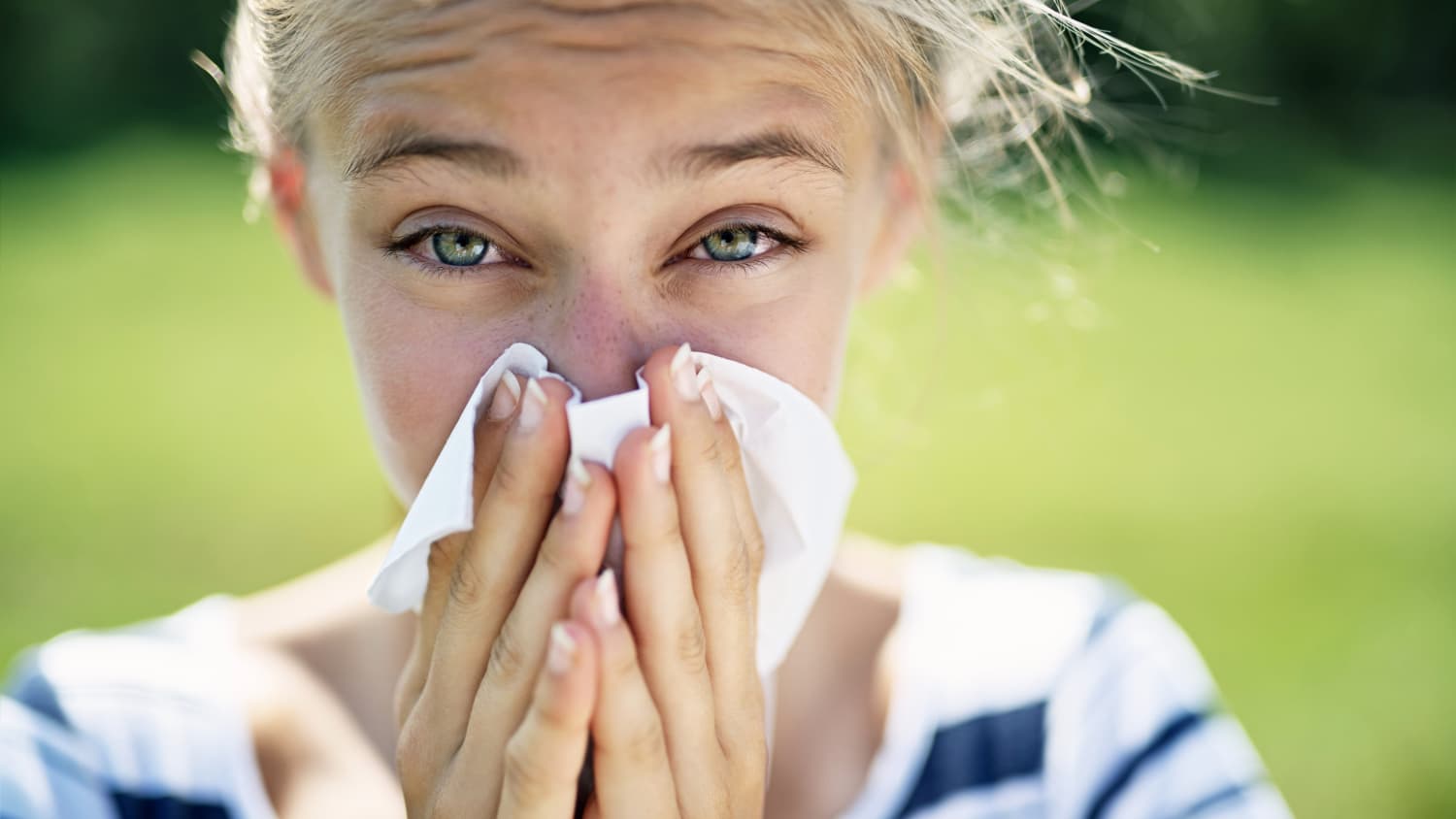 woman with nasal congestion from seasonal allergies