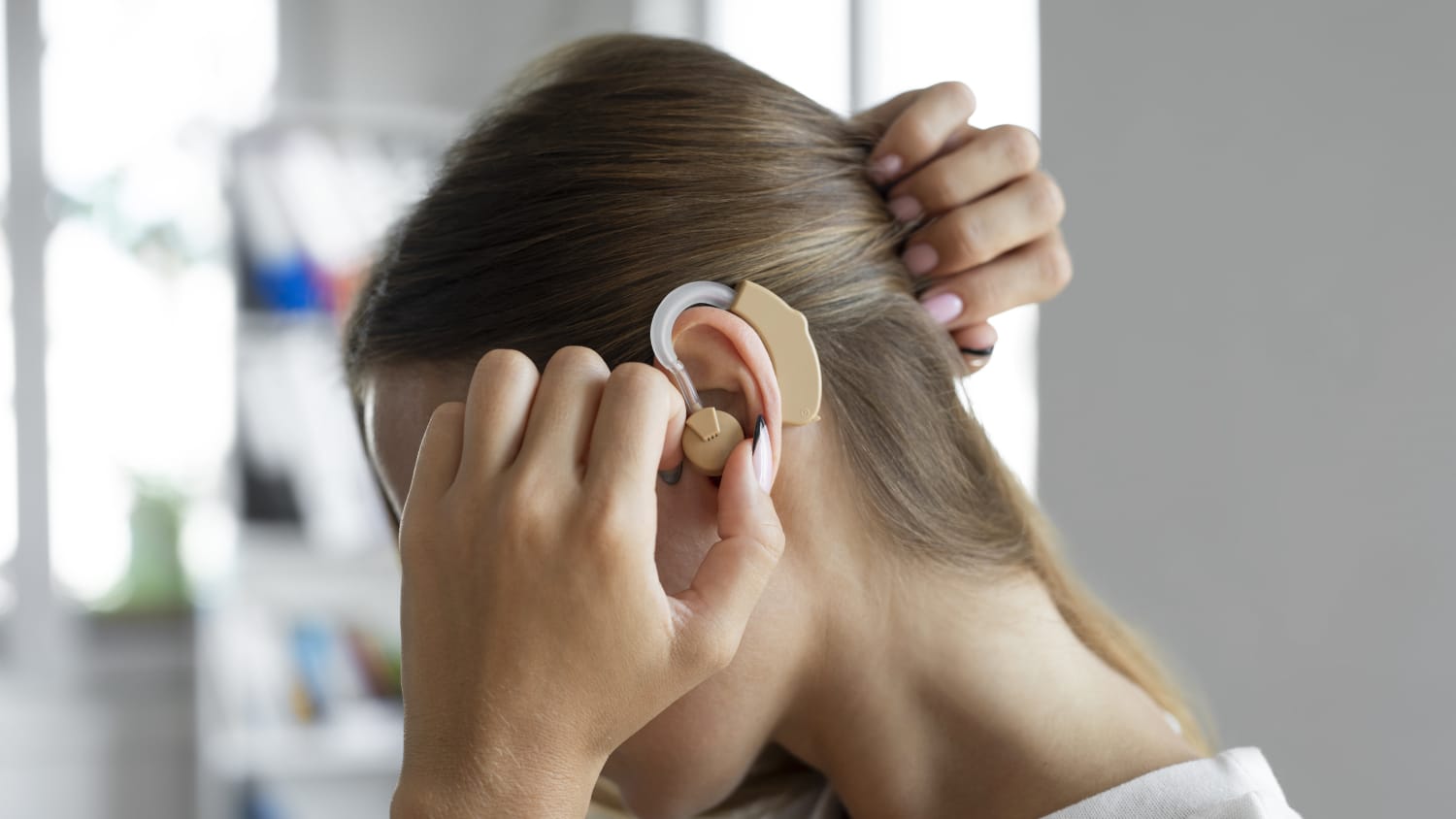 woman wearing hearing aid