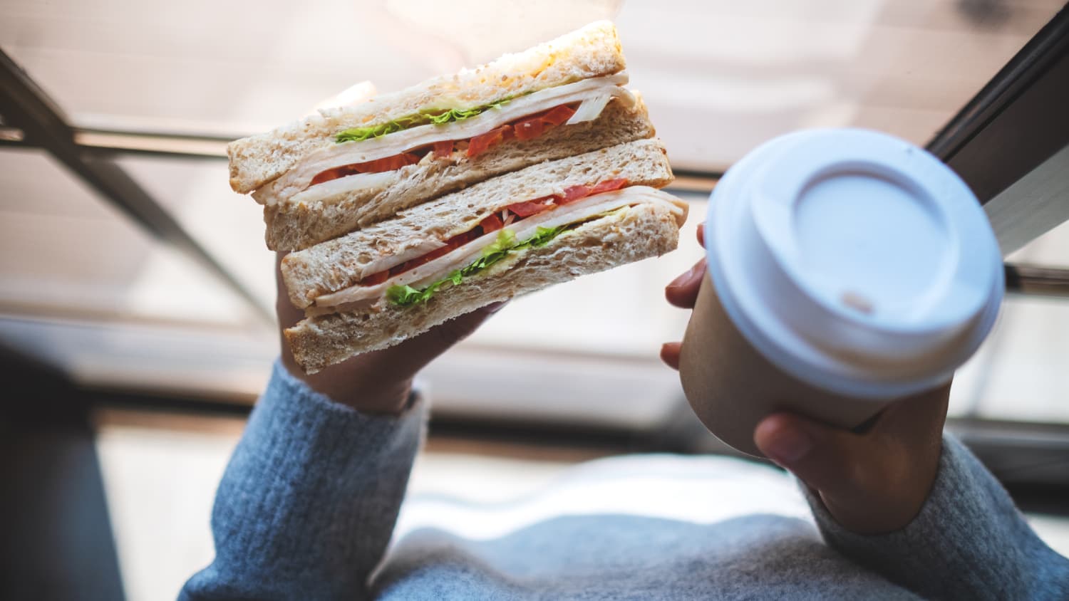 person holding a cold cut sandwich, worried about listeria