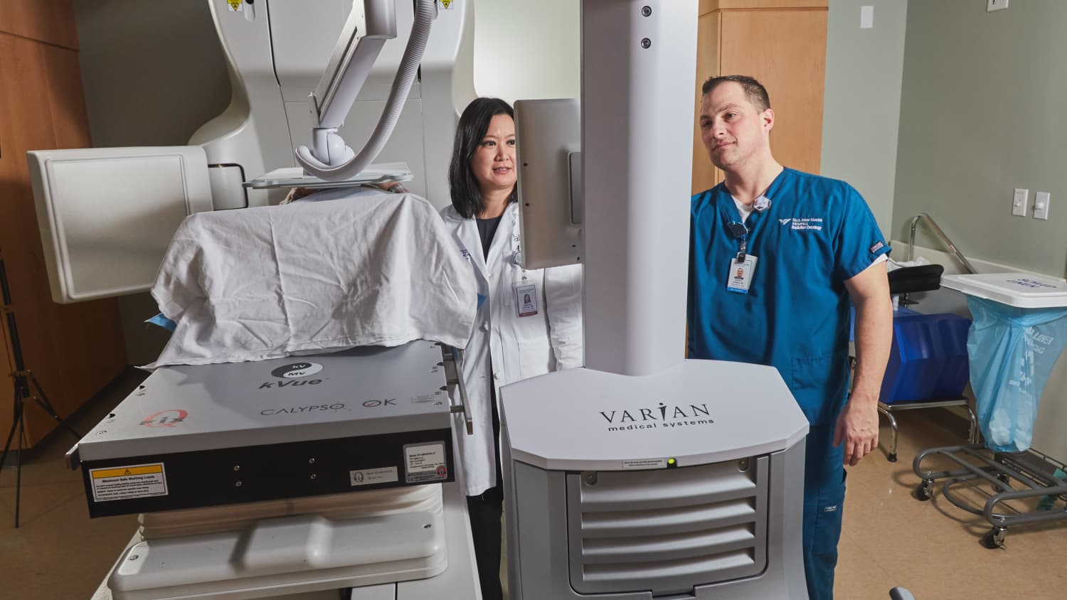 Dr. Johung and Daniel Longo, RTT with a patient in the CALYPSO machine.