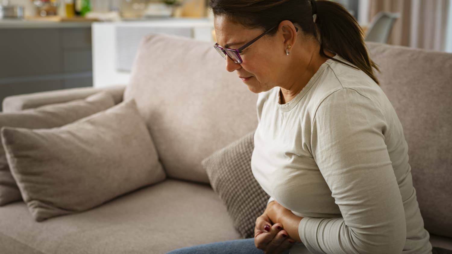 woman experiencing Gastroparesis