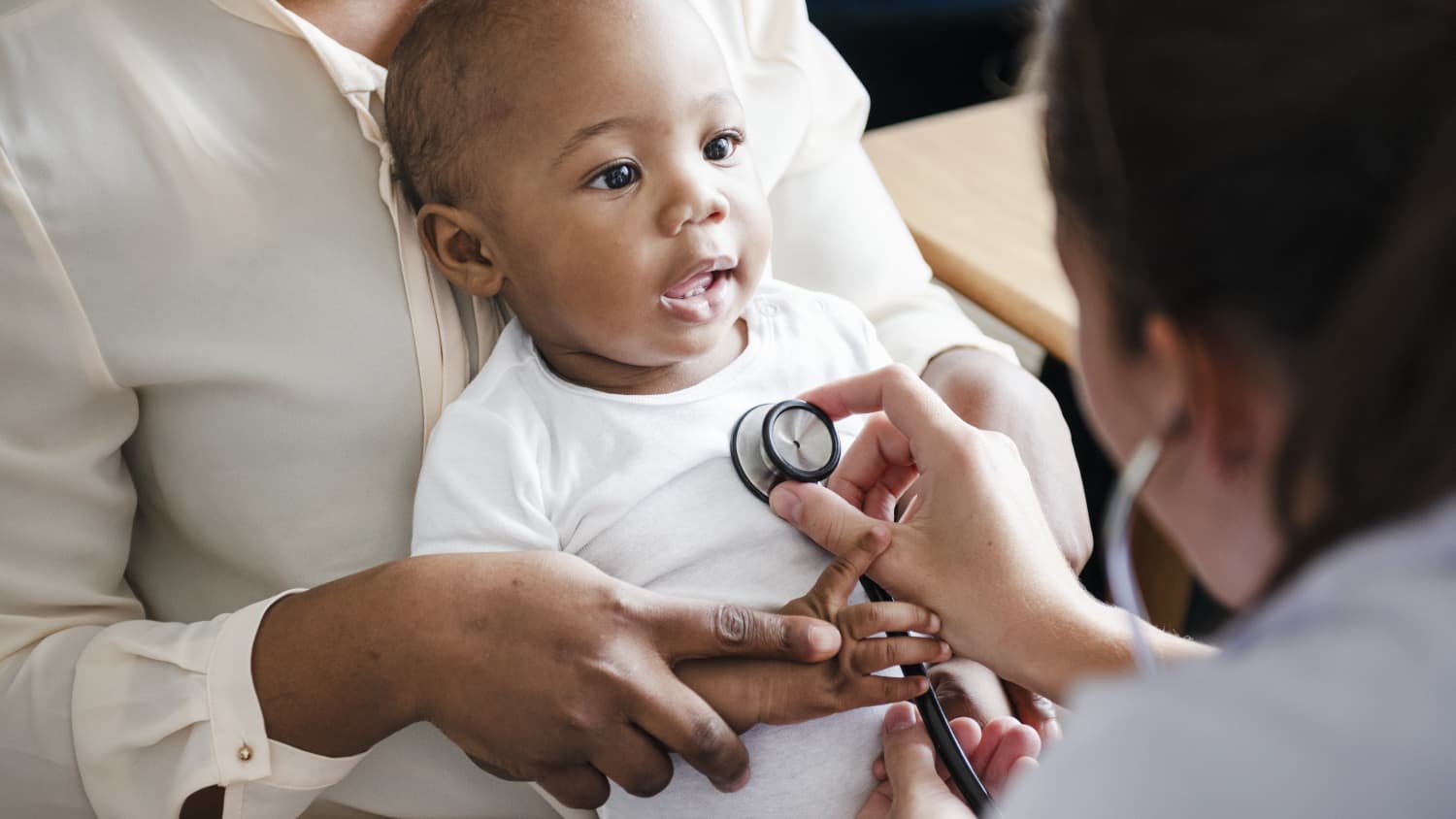 baby getting blood test, possibly for whole genome sequencing