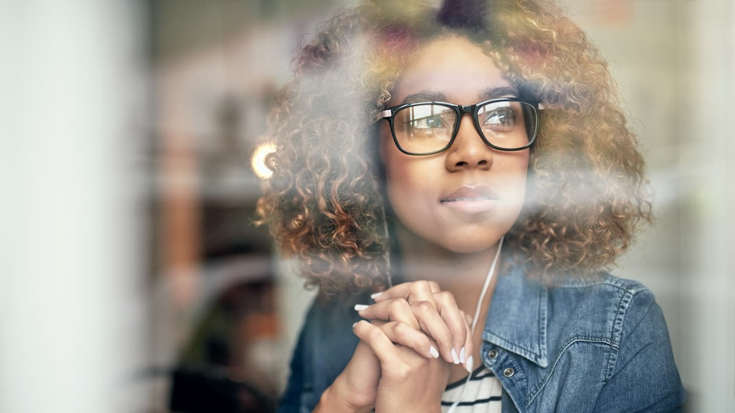 woman looking out window after uterine sarcoma treatment