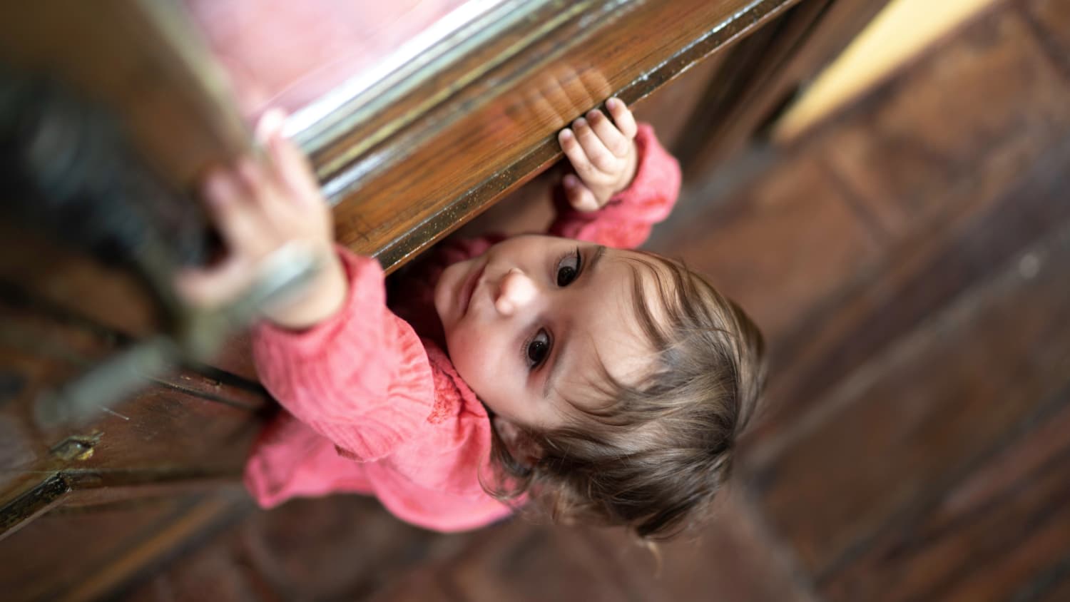 child climbing up cabinet, possibly needing to go to the ED during COVID-19