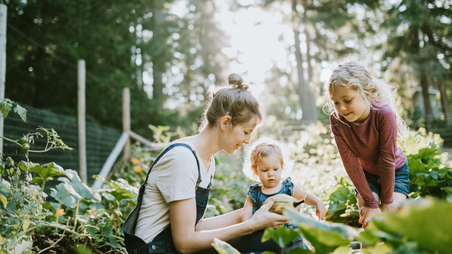 Family gathering outside during COVID-19, mindful of using sunscreen to protect against skin cancer