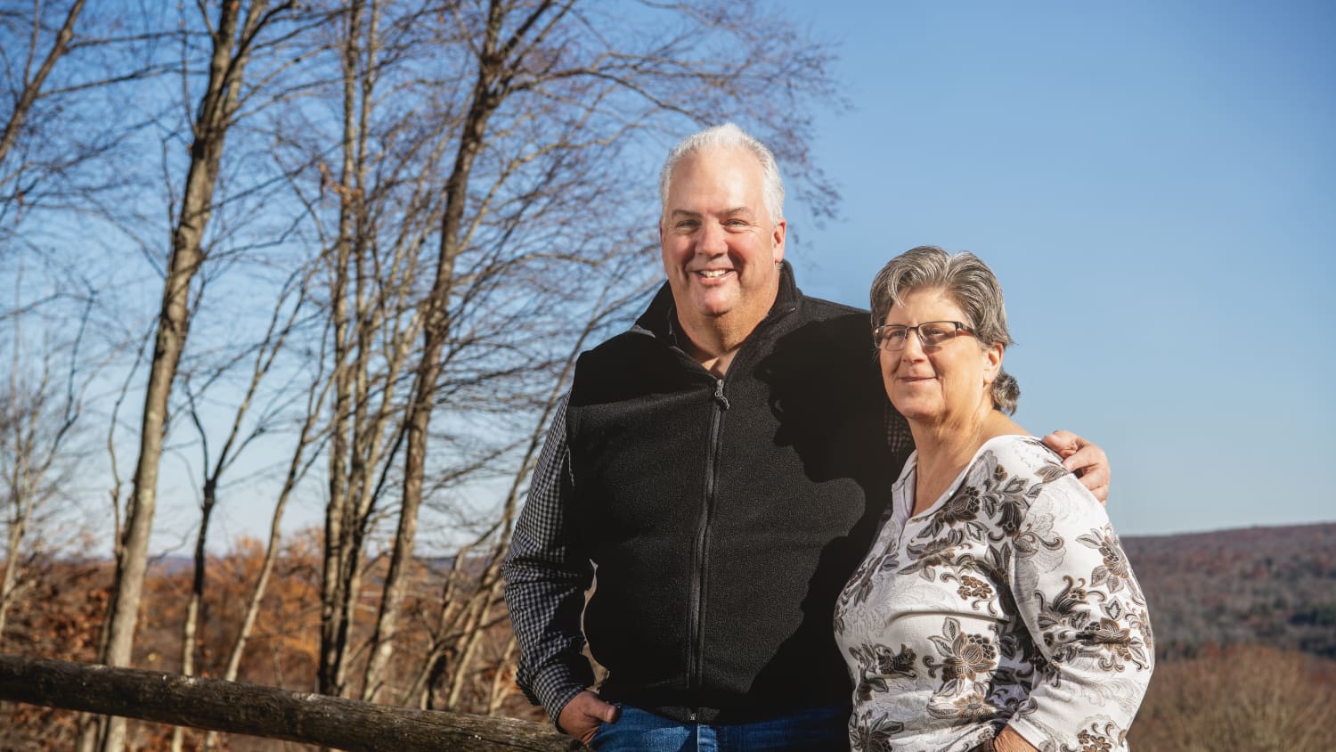 Bruce Brown and wife in the woods