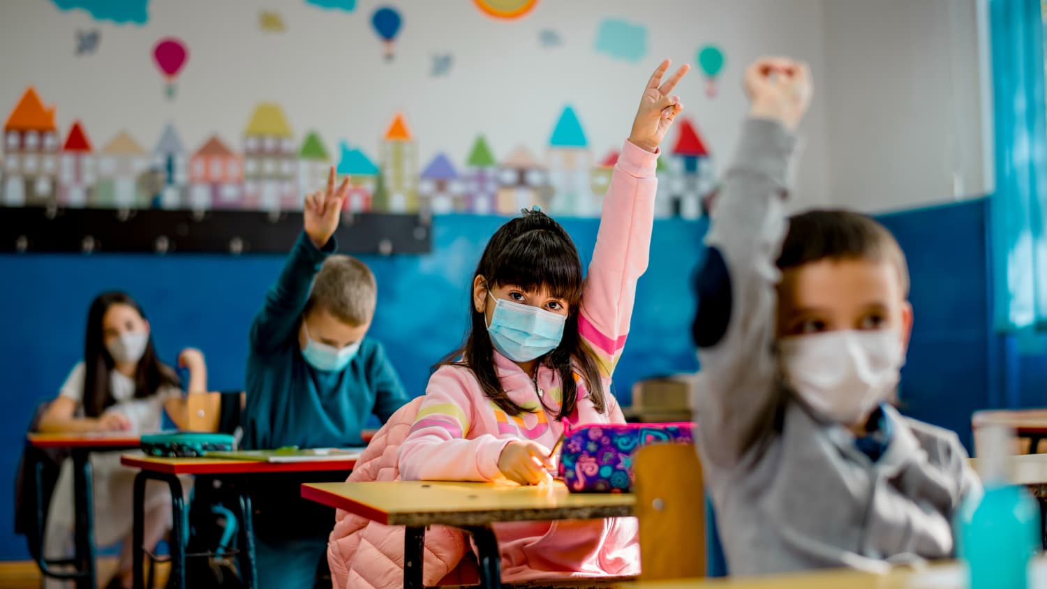 masked kids in a classroom