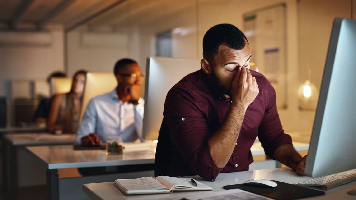 person sitting at an office desk