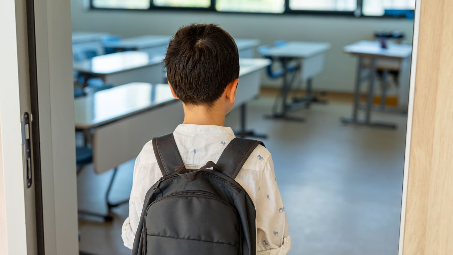 child entering classroom