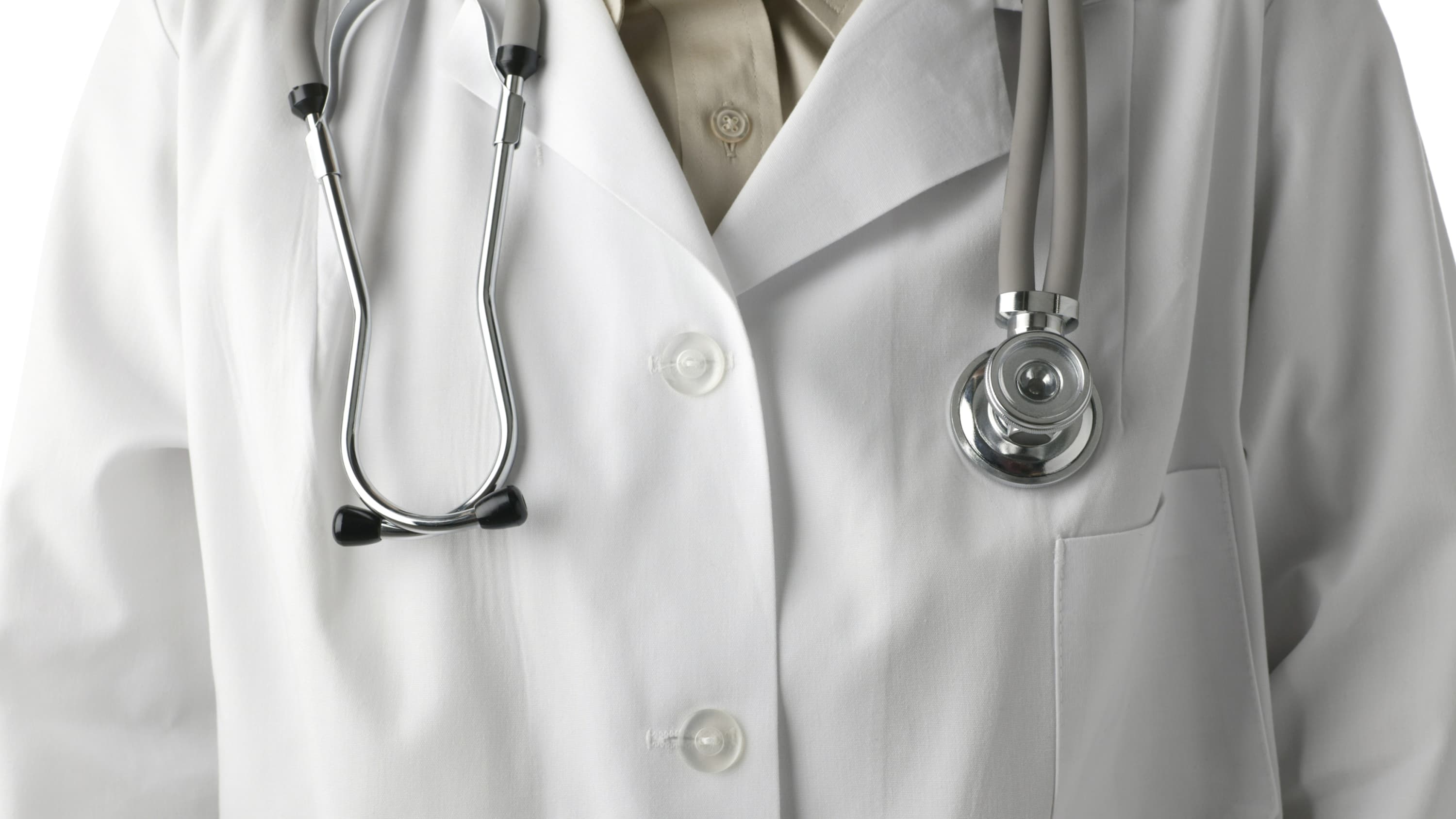 A close up of a doctor's coat is shown.