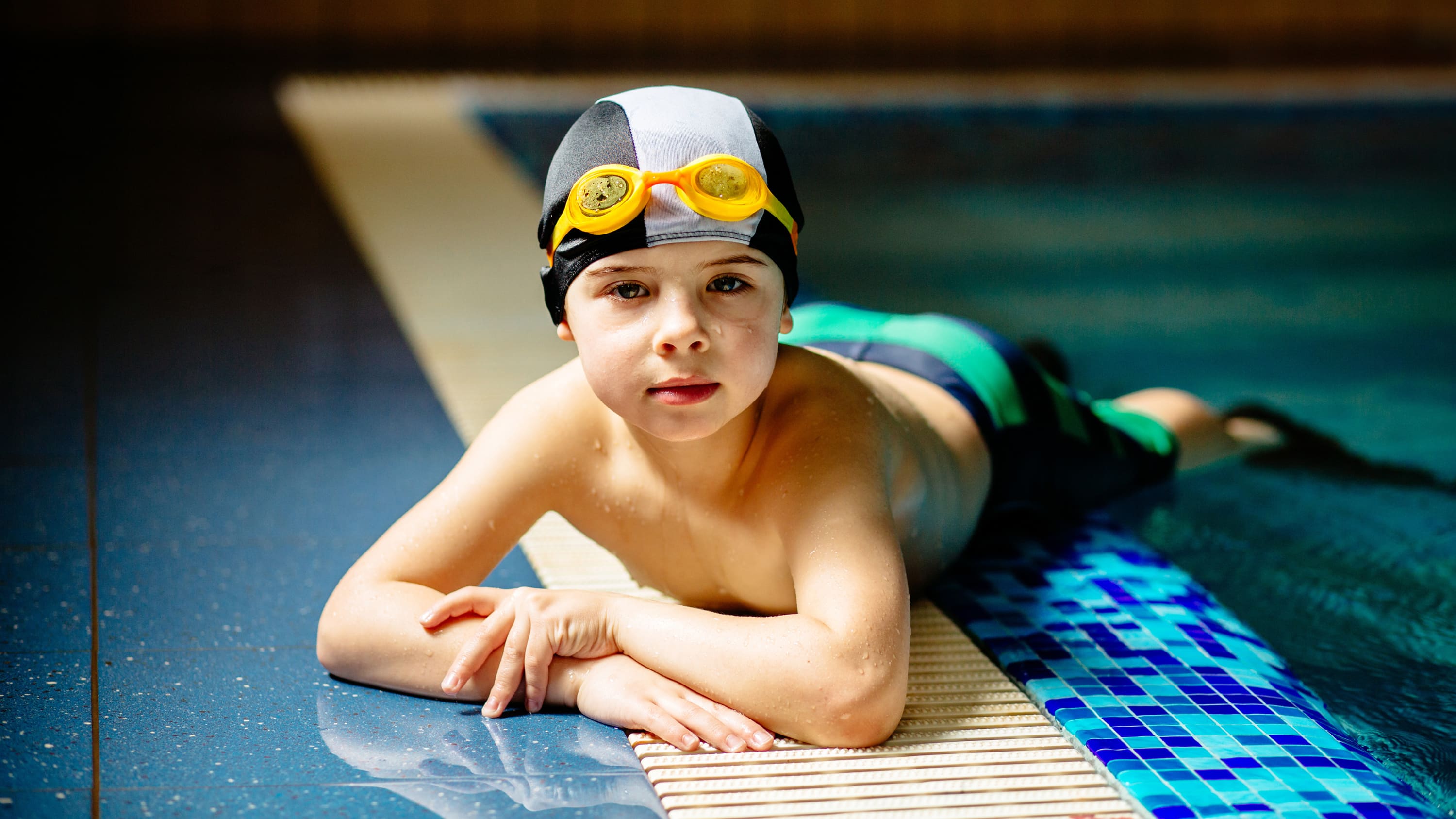 young boy swimming
